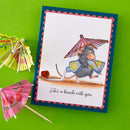 Card with a mouse illustration and beach-themed text on a green background with small paper umbrellas.