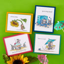 Four colorful greeting cards with illustrations on a green background