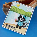 Card with a cartoon badger holding an ice cream, set against a scenic background with mountains and trees.