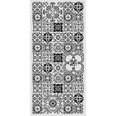 Decorative metal screen with black geometric pattern on a white background