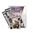 Halloween-themed Junk Journal set with stamps, stencils, and other crafting items on a white background.