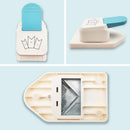 Wooden die-cutting machine with blue handle on a light blue background