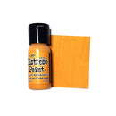 Bottle of Ranger Distress Paint with a swatch of orange color on a white background