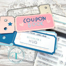 Coupon book with pink and blue design on a wooden surface