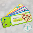 Colorful card holder with heart-shaped pizza design and text on a light gray background.