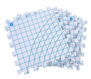 Grid-patterned foam puzzle tiles on a white background