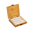Wooden jewelry box with compartments on a white background