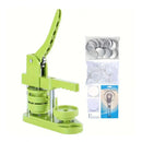 Green button maker machine with packaging of buttons and tool on a white background