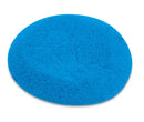 Blue circular felt patch on a white background