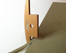 Wooden tool with a strap on a white background