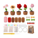 Craft kit with yarn, hooks, and flower-shaped pots on a white background