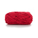 Red skein of yarn on a white background