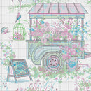 Colorful cross-stitch pattern of a vintage ice cream cart with flowers and birds.