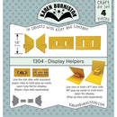Karen Burniston craft die set packaging with yellow display helpers on a blue background
