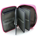 Pink makeup organizer with gray interior on a white background