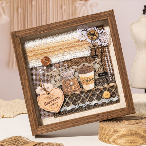 Decorative shadow box with coffee-themed elements and wooden frame.
