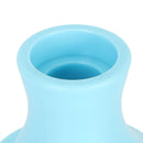Light blue silicone cup on a white background