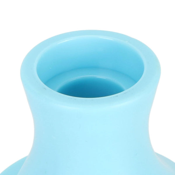 Light blue silicone cup on a white background
