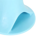 Close-up of a blue silicone mat with a white border on a light gray background