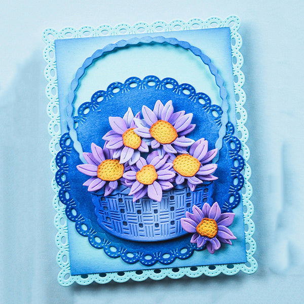 Decorative card with a blue basket of purple flowers on a light blue background