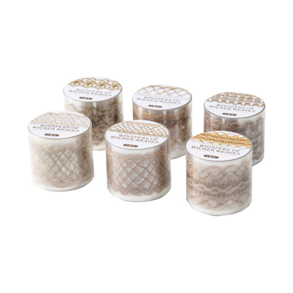 Set of six small cylindrical candles with decorative lids on a white background