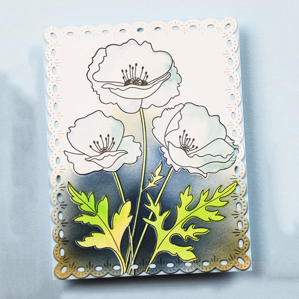 Metallic flower die cut on a light blue background