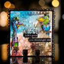 Decorative sign with cartoon birds and 'Life's good, you should get one' text on a blurred background.