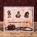 Decorative card with illustrations of a woman, a camera, and text on a wooden surface.