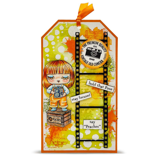 Decorative tag with a cartoon character holding a camera, surrounded by film-themed elements on a white background.