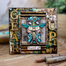 Decorative card with a steampunk-themed character and text on a wooden surface.