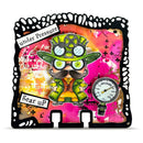 Decorative wall art with a character wearing goggles and a hat, surrounded by colorful abstract designs and text.