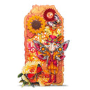 Colorful fairy character with butterfly wings and flowers on a white background