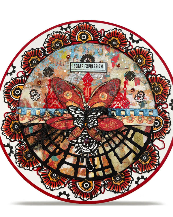 Decorative plate with a butterfly design and 'Scrap Expression' branding.