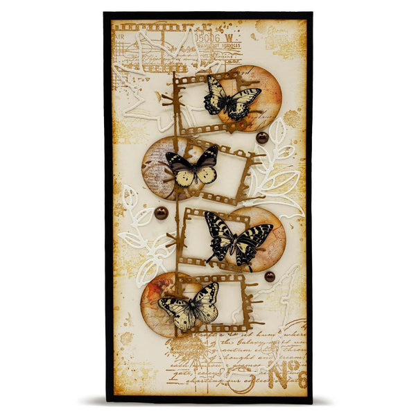 Decorative wall art with butterflies and film reels on a textured background