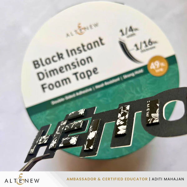 Black instant dimension foam tape with packaging on a white background