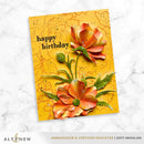 Yellow birthday card with orange flowers and 'happy birthday' text on a marble background