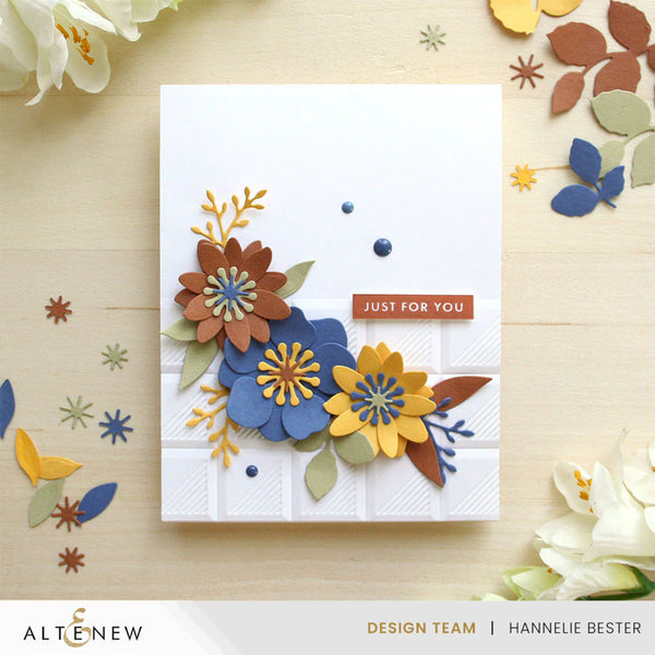 Card with colorful floral design and 'Just for You' text on a wooden surface with decorative elements.