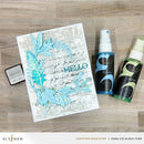 Card with blue leaf design and two spray bottles on a wooden surface, featuring the Alté New brand.