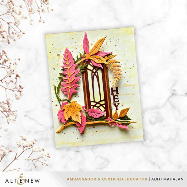 Decorative card with floral elements and 'HEY' text on a marble surface, featuring the brand 'Altenew'.