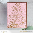 Decorative card with floral design and text on a pink background, featuring the brand 'Altenew'.