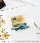 Watercolor painting of a landscape with a sunset and flowers, featuring the brand 'Alte & New'.