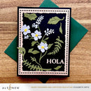 Card with floral design and 'Hola' text on a wooden surface, featuring the brand 'Altenew'.