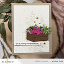 Greeting card with floral design and text 'you're growing stronger every day' by Altenew.
