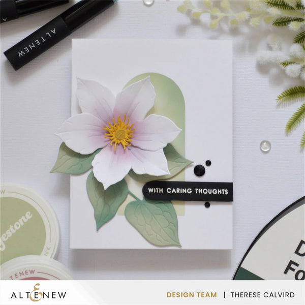 Card with a floral design and 'With Caring Thoughts' message, featuring Altenew branding.