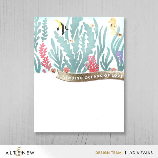 Underwater scene card with fish and coral on a gray background, featuring the brand 'Altenew'.