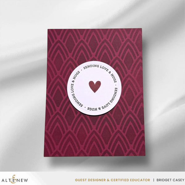 Card with geometric pattern and heart design on a white background