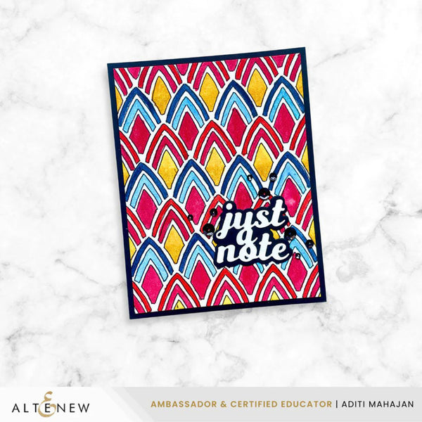 Colorful card with geometric pattern and 'just a note' text on a marble background, featuring the brand 'Altenew'.