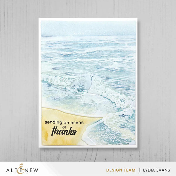 Poster with ocean scene and 'sending an ocean of thanks' text on a gray background