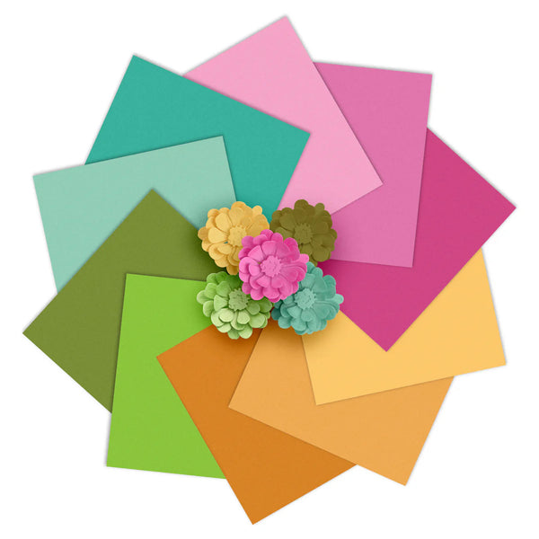 Colorful paper squares with floral decorations on a white background