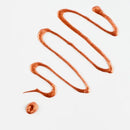 Orange smudge on a white background
